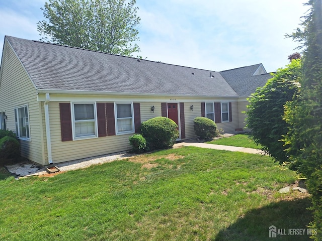 458 Revere Way Unit A, Monroe, NJ 08831 - view of front facade featuring roof with shingles and a front lawn