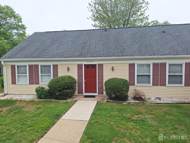 458 Revere Way Unit A, Monroe, NJ 08831 - view of front of property with a front yard and roof with shingles