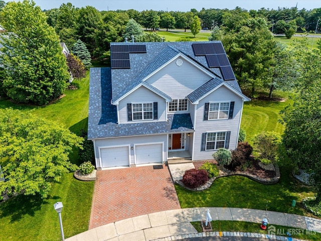 37 Muirfield Blvd, Monroe, NJ 08831 - traditional home featuring an attached garage, decorative driveway, a front yard, and roof with shingles