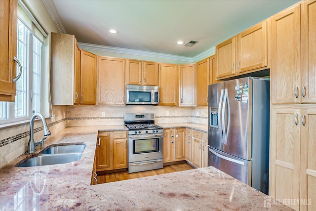 37 Muirfield Blvd, Monroe, NJ 08831 - kitchen featuring stainless steel appliances, light stone countertops, light brown cabinetry, decorative backsplash, and crown molding