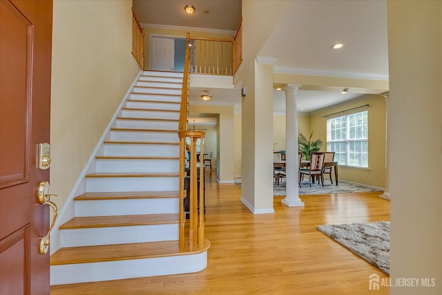 37 Muirfield Blvd, Monroe, NJ 08831 - stairway featuring decorative columns, ornamental molding, wood finished floors, and recessed lighting