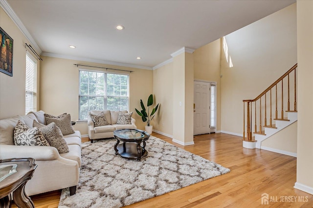 37 Muirfield Blvd, Monroe, NJ 08831 - living room with wood finished floors, ornamental molding, stairs, and recessed lighting
