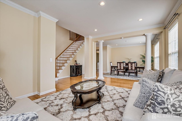 37 Muirfield Blvd, Monroe, NJ 08831 - living area with decorative columns, wood finished floors, stairway, recessed lighting, and crown molding
