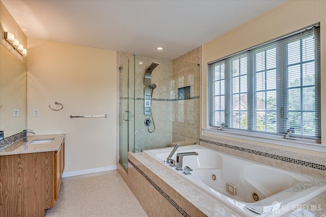 37 Muirfield Blvd, Monroe, NJ 08831 - full bath with a stall shower, a jetted tub, tile patterned floors, and double vanity
