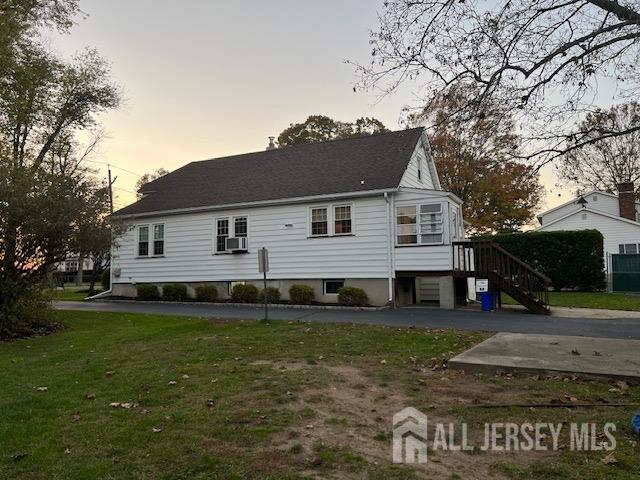 79 Davidson Mill Rd, South Brunswick, NJ 08902 - rear view of house with a yard