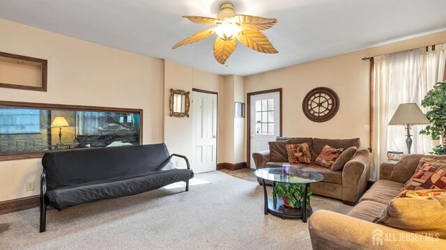 living room with ceiling fan