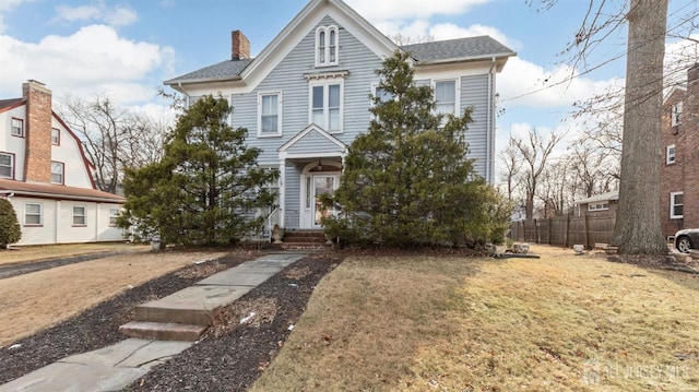 view of front of home with a front yard