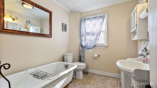 bathroom with toilet and a washtub