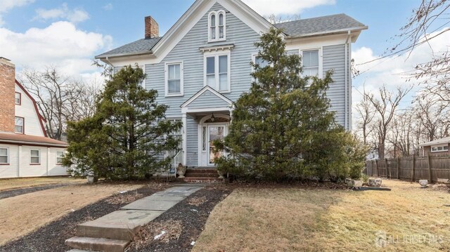 view of front of home with a front yard