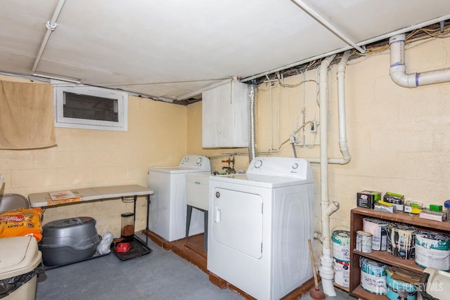 laundry area with separate washer and dryer