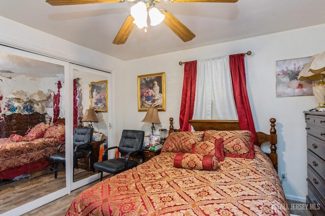 bedroom with ceiling fan, a closet, and wood-type flooring