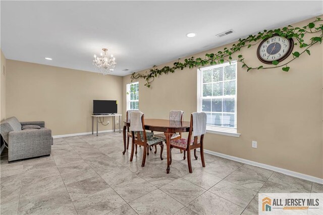 161 Metuchen Ave, Woodbridge Proper, NJ 07095 - dining room featuring a chandelier, baseboards, and recessed lighting