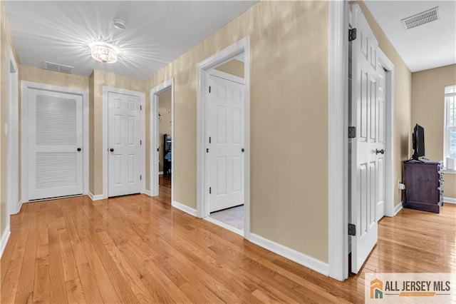 161 Metuchen Ave, Woodbridge Proper, NJ 07095 - hall with light wood-style flooring and baseboards