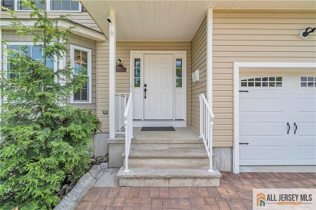 161 Metuchen Ave, Woodbridge Proper, NJ 07095 - doorway to property with a garage