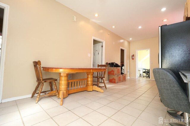 dining room with light tile patterned flooring