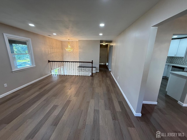 179 Buckelew Ave Unit A, Jamesburg, NJ 08831 - empty room with a chandelier, dark wood-style floors, and recessed lighting
