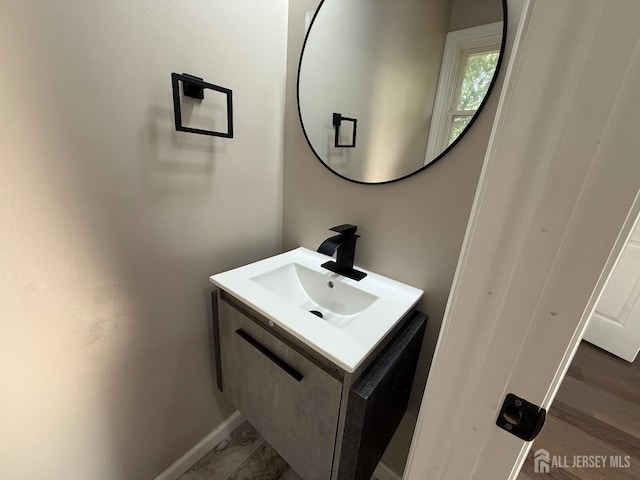 179 Buckelew Ave Unit A, Jamesburg, NJ 08831 - bathroom featuring baseboards and vanity