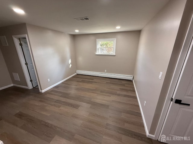 179 Buckelew Ave Unit A, Jamesburg, NJ 08831 - spare room with a baseboard heating unit, wood finished floors, and recessed lighting