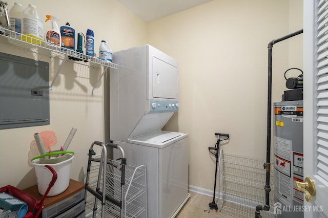540 Cranbury Rd Unit 407, East Brunswick, NJ 08816 - washroom featuring water heater, stacked washer / drying machine, electric panel, and laundry area