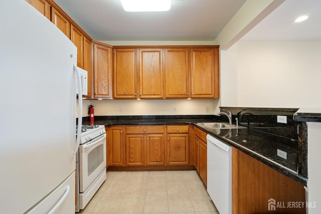 540 Cranbury Rd Unit 407, East Brunswick, NJ 08816 - kitchen with a sink, brown cabinets, light tile patterned floors, and white appliances