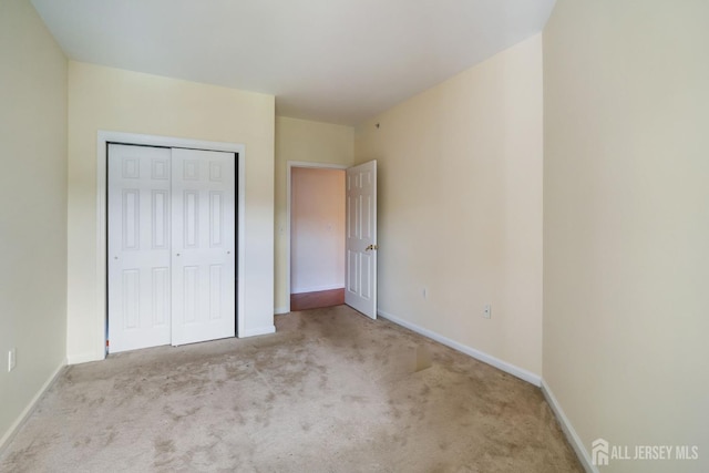 540 Cranbury Rd Unit 407, East Brunswick, NJ 08816 - unfurnished bedroom with carpet floors, baseboards, and a closet