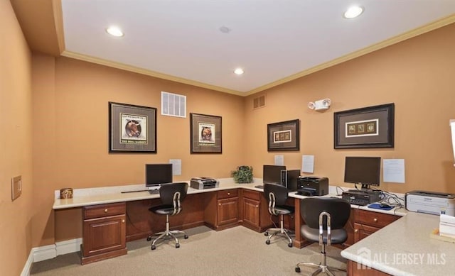 office space featuring ornamental molding, visible vents, and baseboards