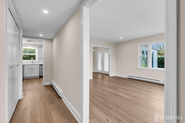 377-B Old Nassau Rd, Monroe, NJ 08831 - hall featuring a baseboard radiator, light wood-type flooring, and recessed lighting