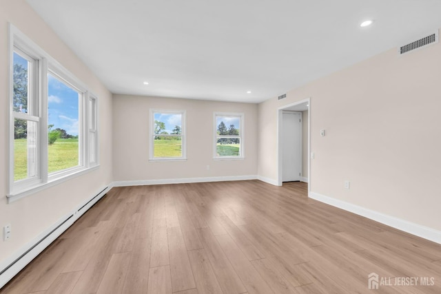 377-B Old Nassau Rd, Monroe, NJ 08831 - empty room with baseboard heating, light wood-style floors, and recessed lighting
