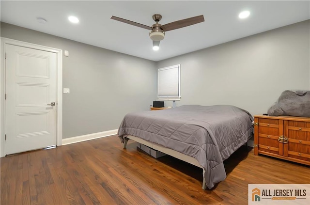 bedroom with hardwood / wood-style floors and ceiling fan