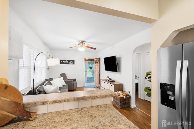 2903 Grasselli Ave, Linden, NJ 07036 - living area with arched walkways, wood finished floors, and a ceiling fan