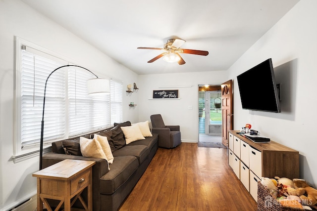 2903 Grasselli Ave, Linden, NJ 07036 - living room featuring a ceiling fan, a baseboard radiator, wood finished floors, and baseboards