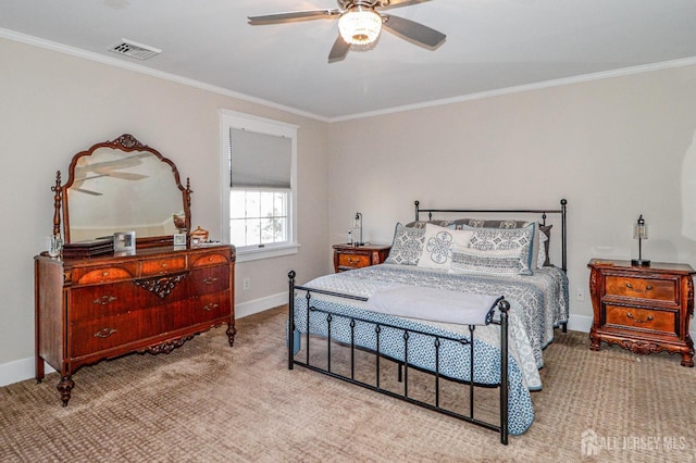 bedroom featuring visible vents, baseboards, and carpet