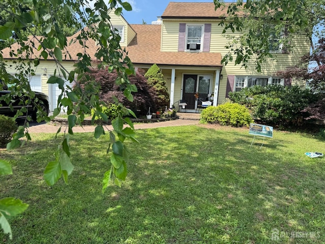 18 High Point Way, Piscataway, NJ 08854 - view of front facade featuring a front yard, covered porch, and roof with shingles
