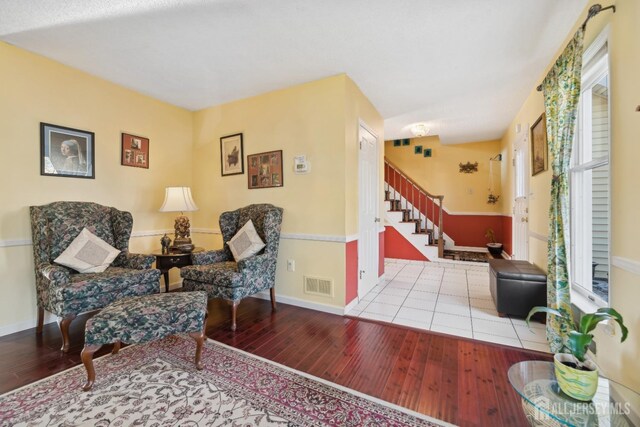 sitting room featuring light hardwood / wood-style floors