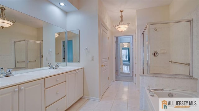 532 Waterside Blvd, Monroe, NJ 08831 - full bath with a shower stall, a garden tub, double vanity, tile patterned floors, and baseboards
