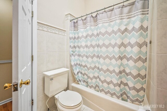 134 Devon Rd, Colonia, NJ 07067 - full bath featuring shower / bath combo and tile walls