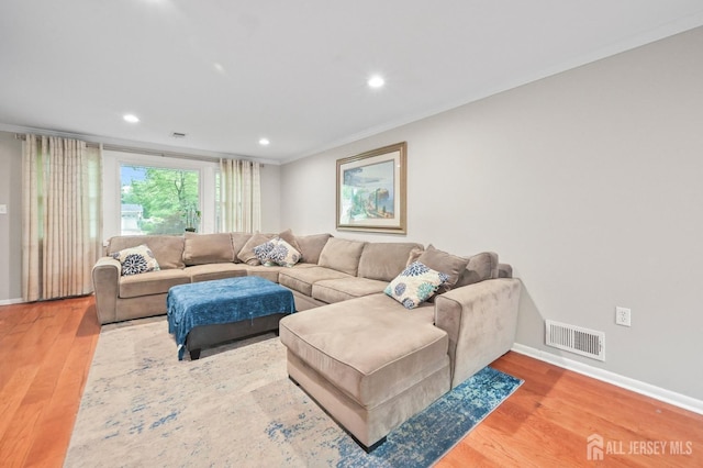 134 Devon Rd, Colonia, NJ 07067 - living area featuring wood finished floors, recessed lighting, and crown molding