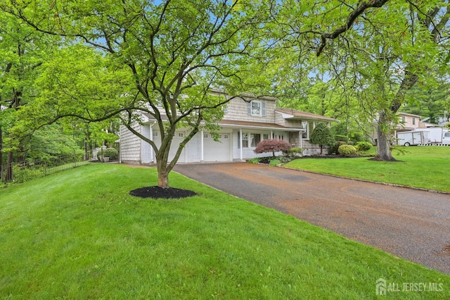 134 Devon Rd, Colonia, NJ 07067 - view of front of property with asphalt driveway