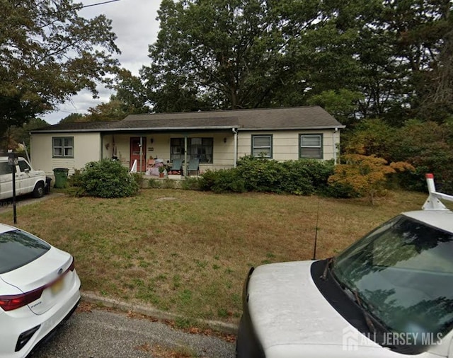 202 Ohio Ave, Egg Harbor Twp, NJ 08234 - single story home featuring a porch and a front lawn