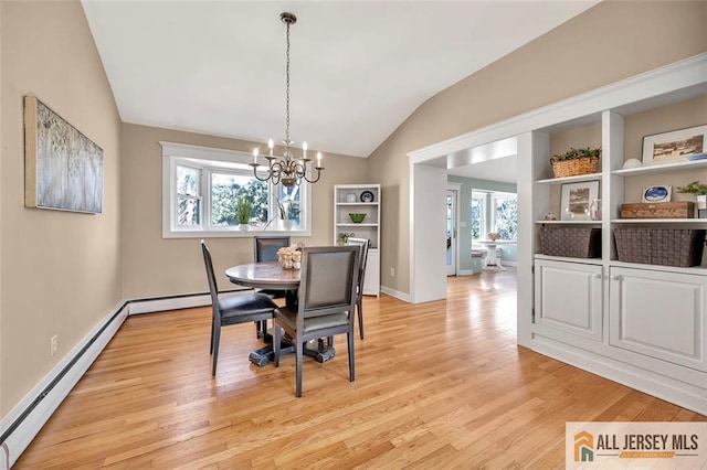 dining room featuring vaulted ceiling, a baseboard heating unit, light wood finished floors, baseboards, and a notable chandelier