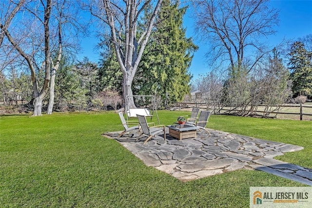view of yard with a patio area and fence