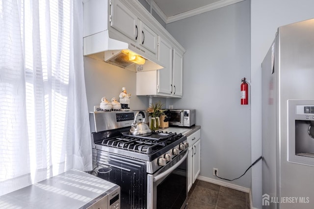 kitchen featuring stainless steel appliances, plenty of natural light, crown molding, and white cabinetry