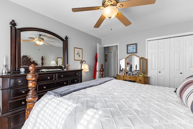 bedroom with ceiling fan and a closet