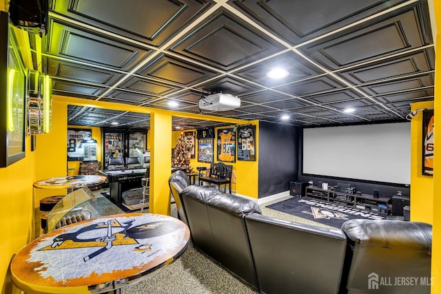 home theater with an ornate ceiling