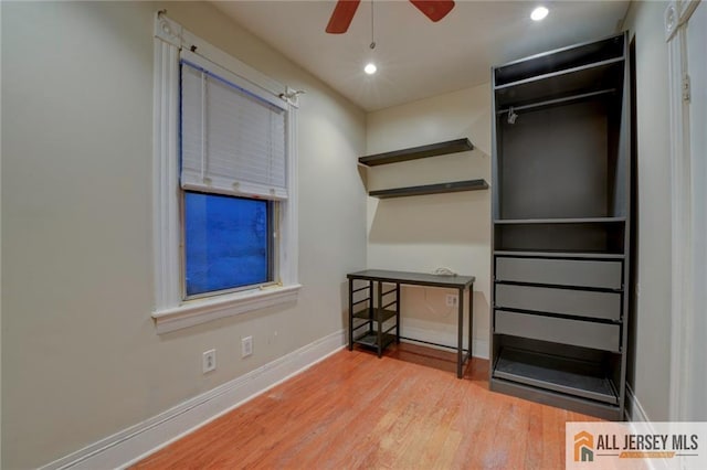 interior space with ceiling fan and light wood-type flooring