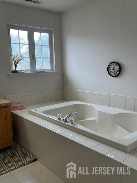 11 Pebble Beach Ct, Monroe, NJ 08831 - full bath featuring tile patterned floors and a garden tub