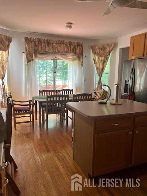11 Pebble Beach Ct, Monroe, NJ 08831 - kitchen featuring ceiling fan, dark wood-type flooring, stainless steel refrigerator with ice dispenser, and a wealth of natural light