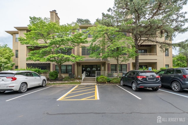 2708 Ridgefield Ct, Helmetta, NJ 08828 - view of building exterior featuring uncovered parking