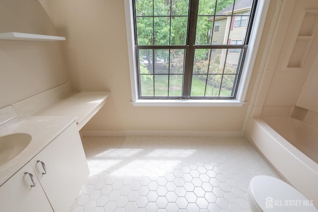 2708 Ridgefield Ct, Helmetta, NJ 08828 - full bath featuring vanity, toilet, baseboards, and shower / tub combination
