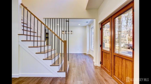 foyer with light hardwood / wood-style flooring